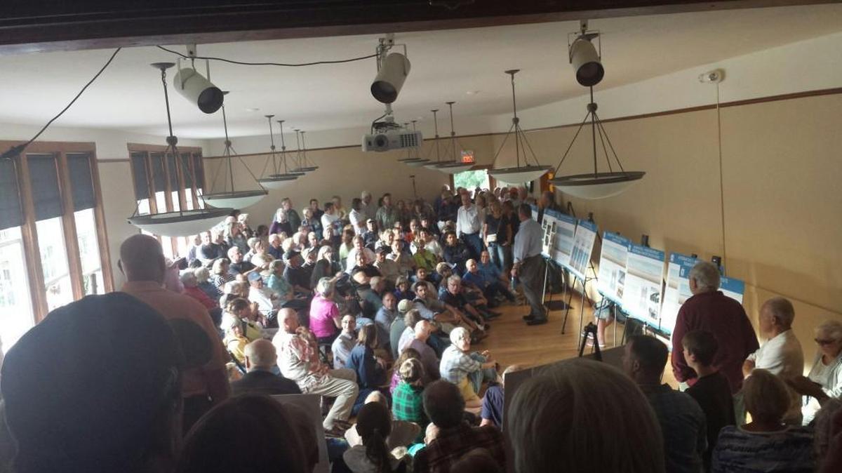 An overflow crowd fills the Nichols Community Center Tuesday, Aug. 2, 2016 on Fox Island. Islanders were there to hear plans to repair or replace the 62-year-old bridge that connects the island to the mainland.