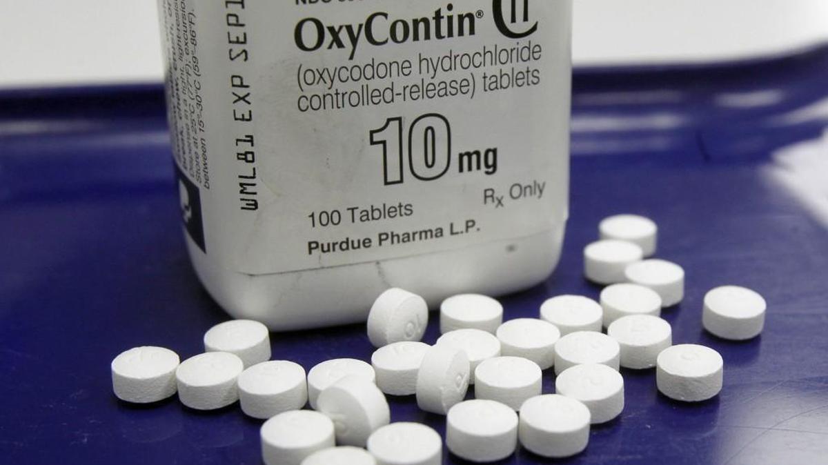 The City of Tacoma is suing three drug companies that make opioids, including the manufacturer of OxyContin, the drug pictured here. This 2013 photo shows OxyContin pills arranged for a photo at a pharmacy in Montpelier, Vermont.