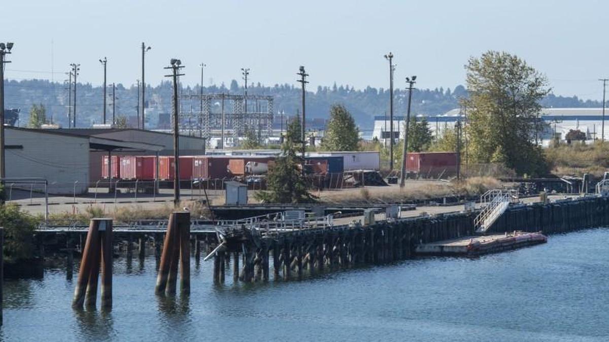 A view Sept. 28 from the East 11th Street bridge of Puget Sound Energy’s proposed 30-acre liquid natural gas plant site on the Tacoma Tideflats. The $275 million plant would be situated along Alexander Avenue and East 11th Street between the Blair (in background) and Hylebos Waterways.