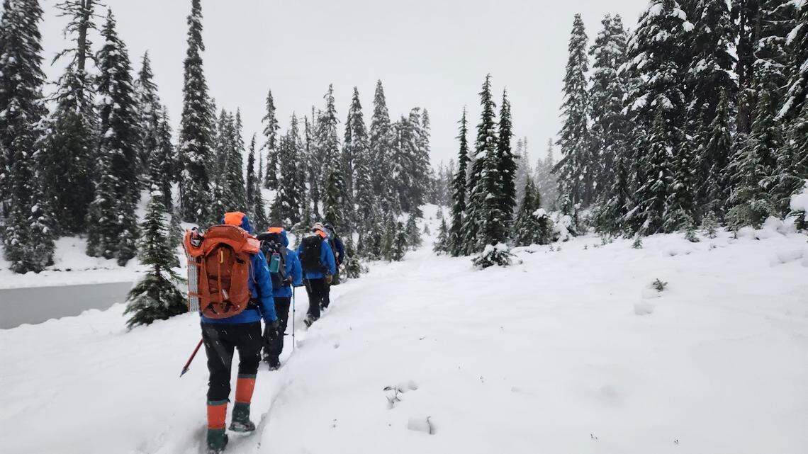 Two hikers were rescued from a snowy mountainside in the Alpine Lakes Wilderness Area. Two hikers were rescued from a snowy mountainside in the Alpine Lakes Wilderness Area.