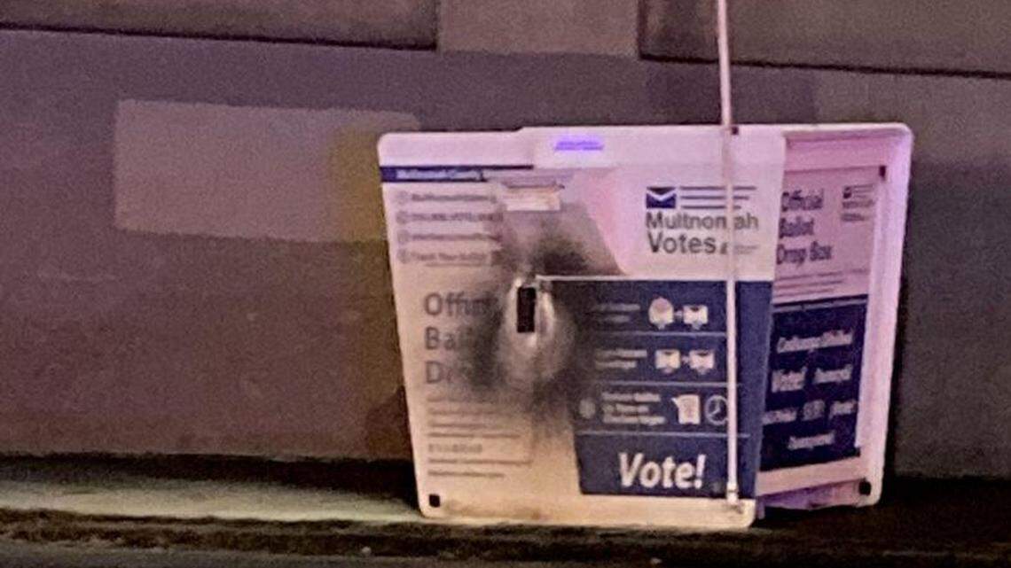 A photo of the burned ballot box in Portland, Oregon, is pictured.