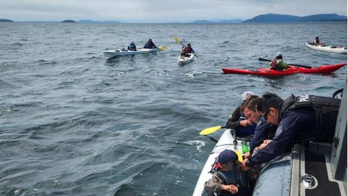 The Coast Guard received a radio report of kayakers in distress between Patos Island and Sucia Island at about 1:50 p.m. Thursday, Aug. 14, the agency said in a news release.