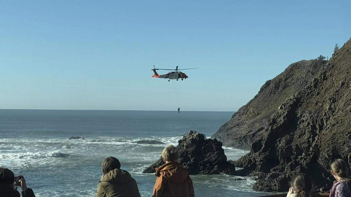 Two boogie boarders were rescued from rocks at Ecola State Park in Oregon, officials said.