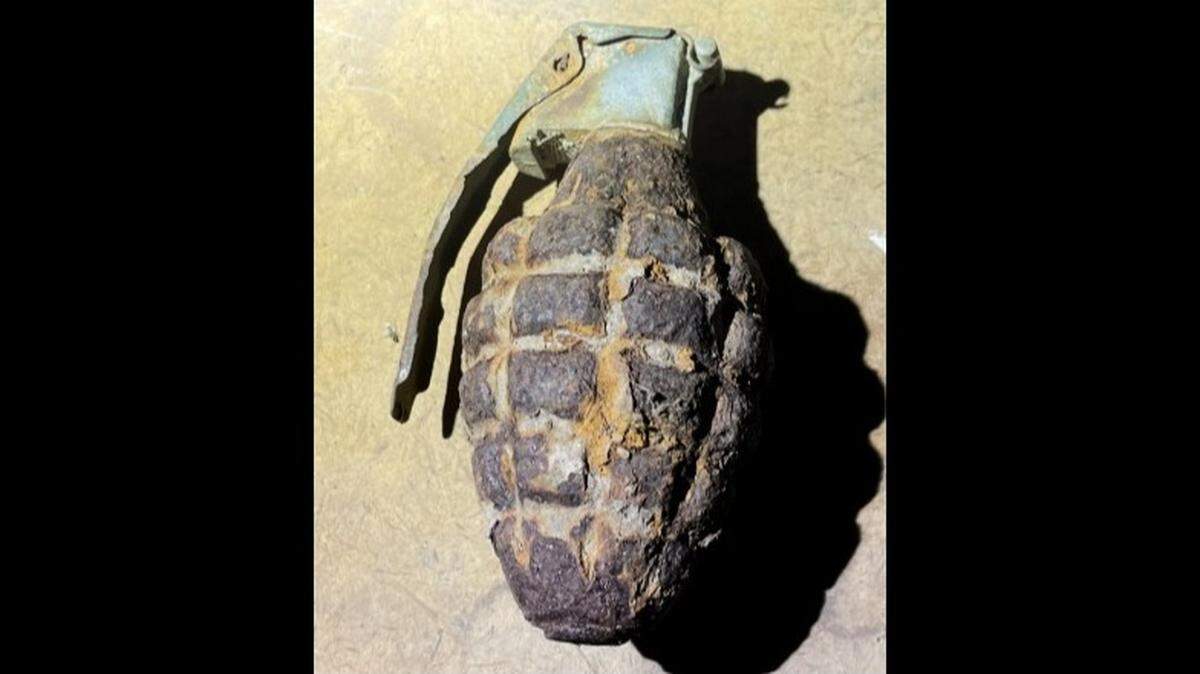 The Washington State Patrol bomb squad determined the grenade was live and safely detonated it in a remote area.