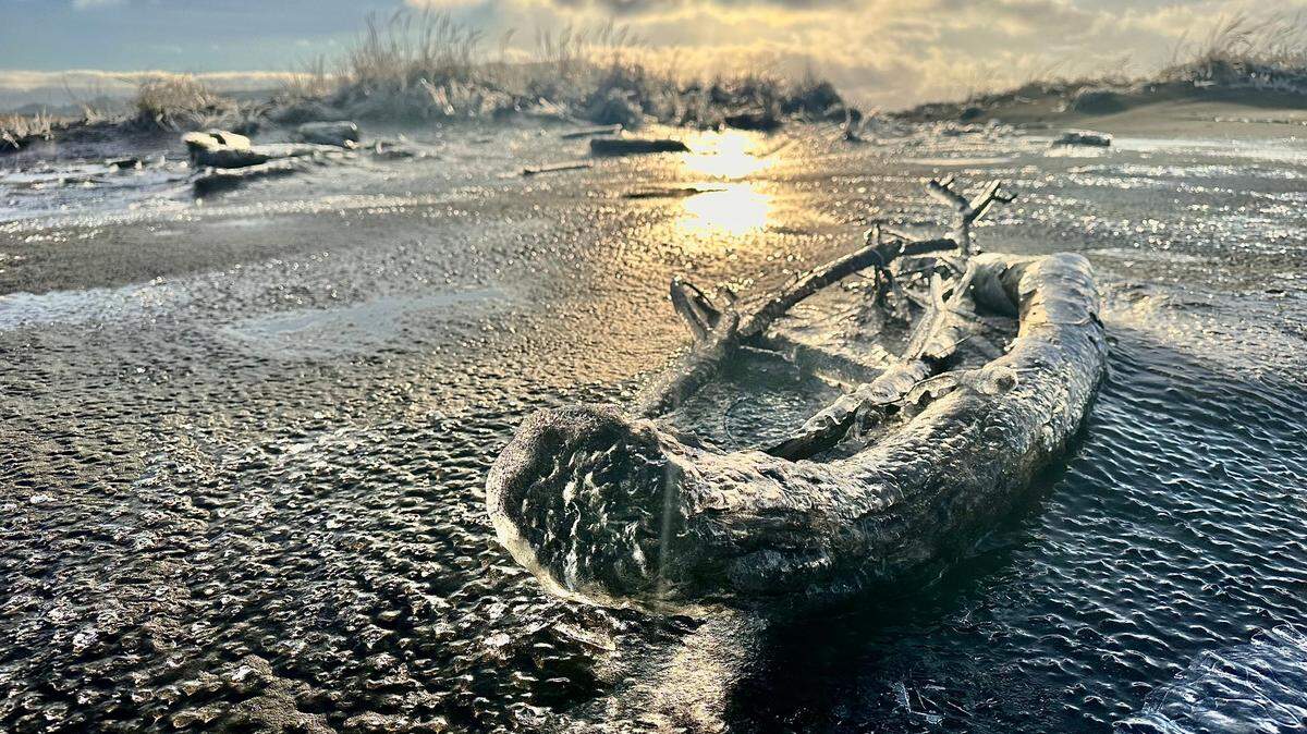 Seaside Beach becomes icy following freezing temperatures on Jan. 14 in Seaside, Oregon.