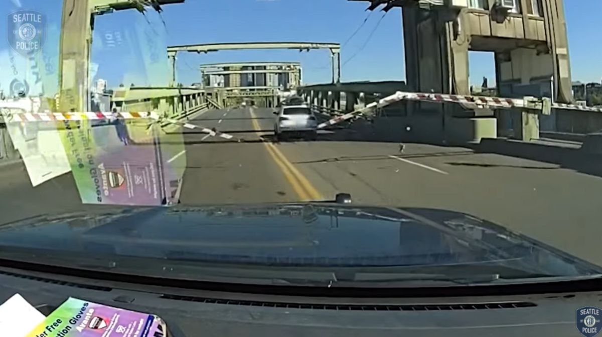 Police tried to pull over a driver with stolen license plates in Seattle. The driver then jumped a “partially raised” drawbridge to escape, authorities said.