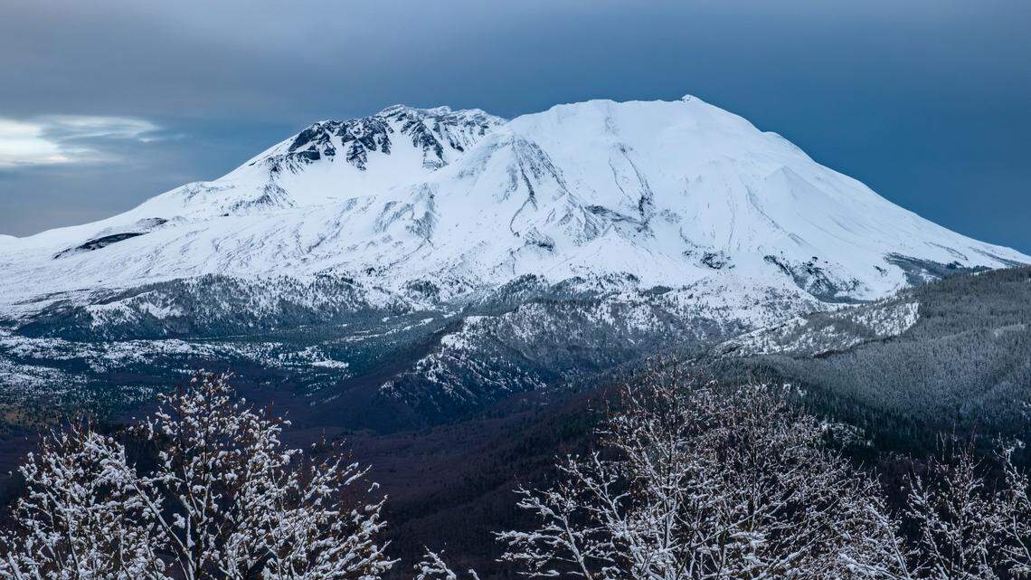 A snowmobiler was caught in an avalanche on Mount Saint Helens, and another rider was injured on the mountain, rescuers said.