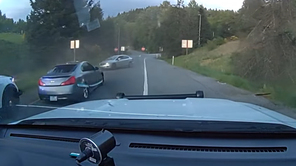 An 18-year-old man in a silver Infiniti G37 is seen stopped between troopers and his fleeing brother in Washington, authorities said.