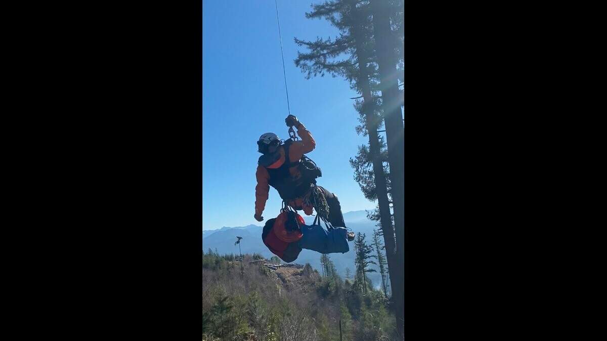 One man was hoisted into a helicopter due to the difficult terrain, deputies said.