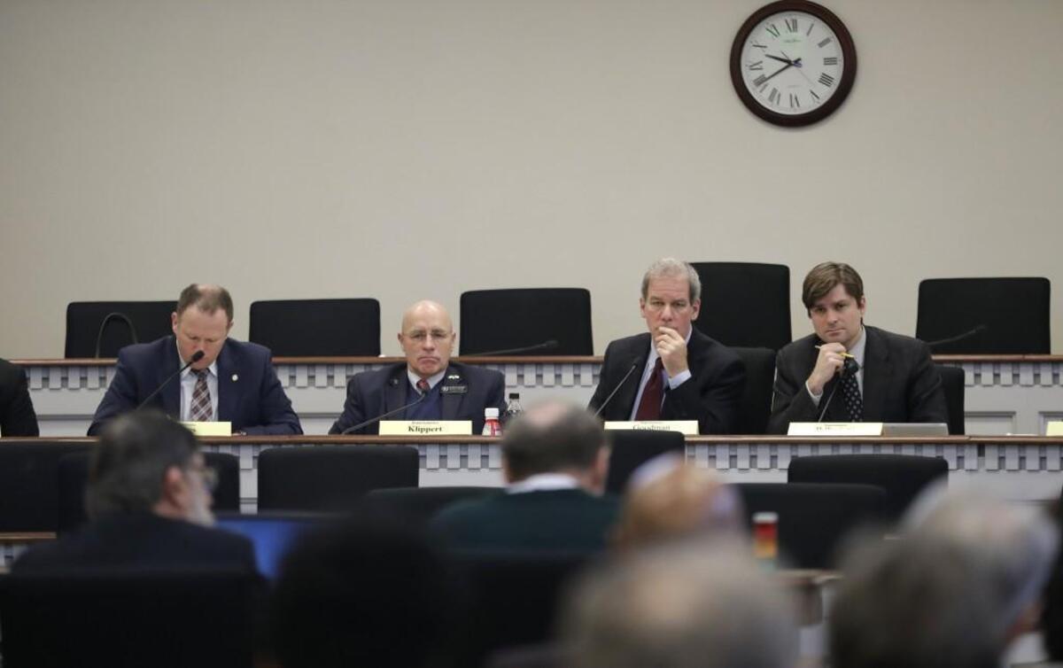 Members of the Washington House Public Safety committee, from left, Rep. Dave Hayes R-Camano Island, Rep. Brad Klippert, R-Kennewick, chairman Rep. Roger Goodman, D-Kirkland, and Rep. Mike Pellicciotti, D-Federal Way, listen to testimony, Tuesday, March 6, 2018, in Olympia, Wash., during a House hearing on the use of deadly force by law enforcement officers. (AP Photo/Ted S. Warren)