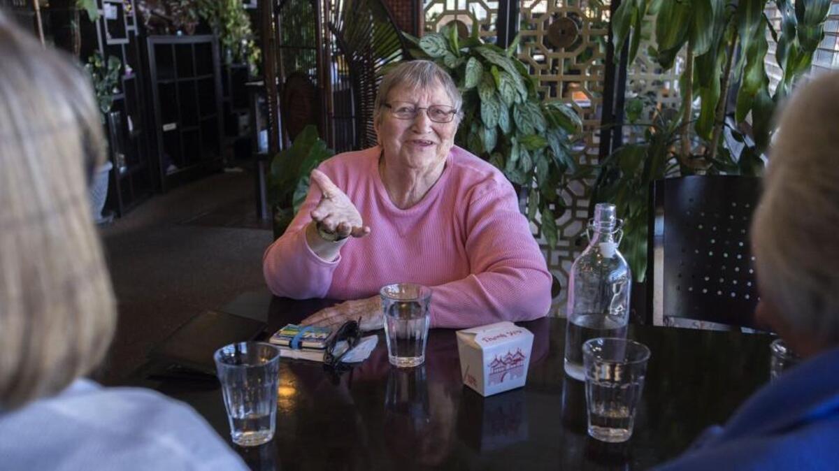 Wanda Riley, 85, enjoys her monthly lunch with her friends last month at the Thai Garden Restaurant in Olympia. Riley retired from a state government job and says that without a state subsidy she and other retirees receive to help pay for her health- insurance premiums, she would have to cut back on expenses, such as going out to eat.