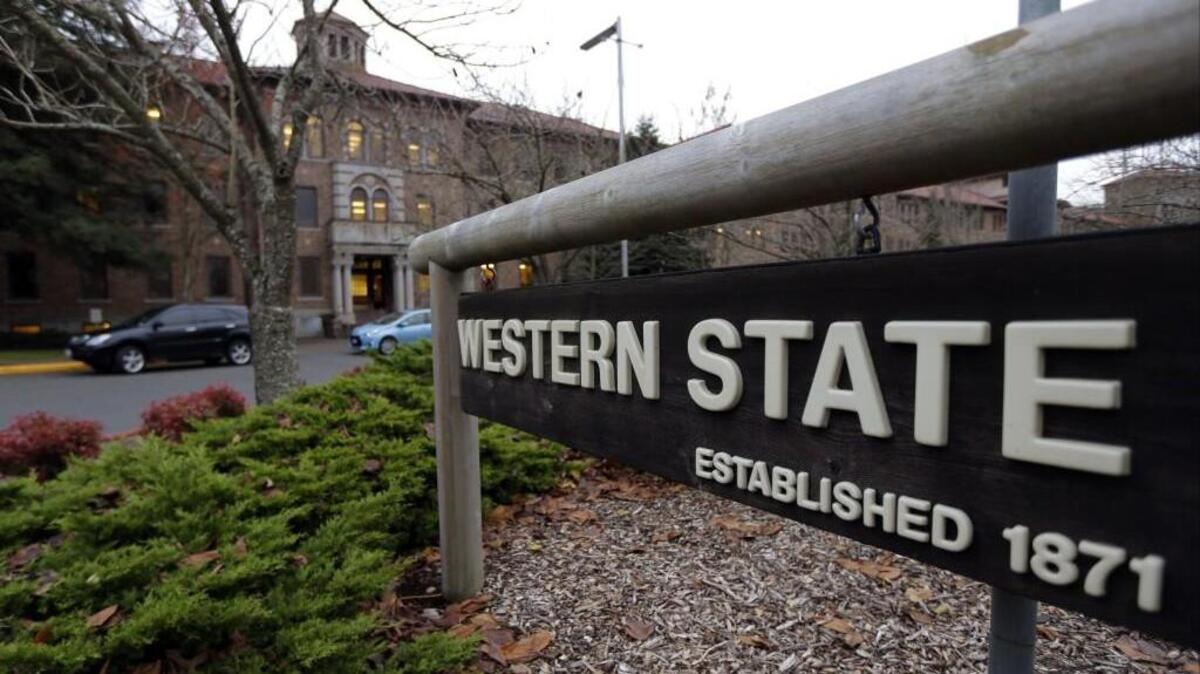 A sign near the main entrance of Western State Hospital in Lakewood. The state’s largest psychiatric hospital has withdrawn from a national accreditation program.