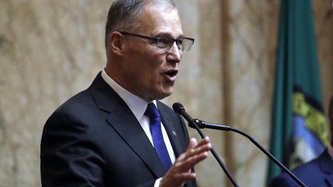 Gov. Jay Inslee speaks during his annual State of the State address before a joint session of the Legislature on Tuesday in Olympia.