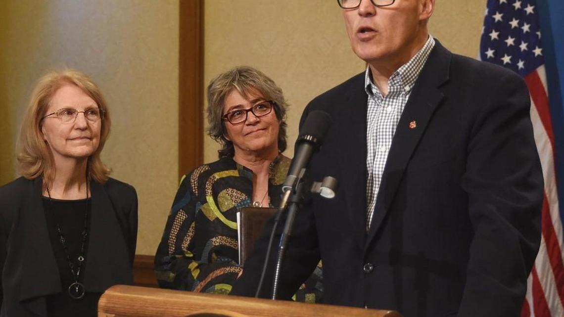 At an April 12 press conference Gov. Jay Inslee along with Department of Social and Health Services' Secretary Pat Lashway, left, introduces Cheryl Strange, the new CEO of Western State Hospital.