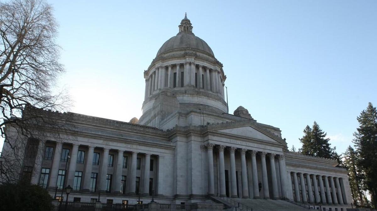 The state Legislative Building in Olympia. A budget forecast shows $354 million extra for funding the state.