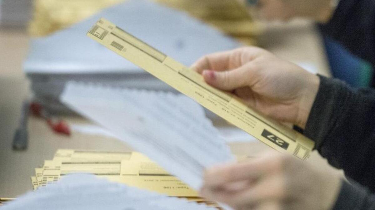 Election workers open ballots at the Pierce County Election Center Nov. 4, 2014.