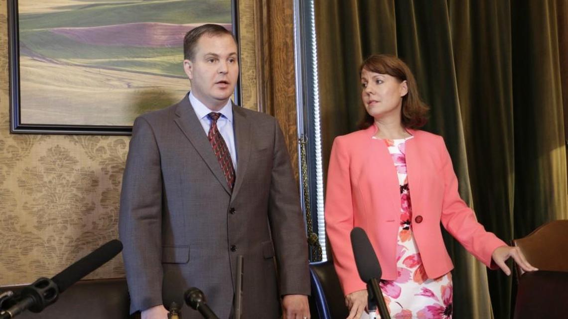 Republican Sens. John Braun and Ann Rivers talk to the media about the agreement reached on an education funding plan, Thursday, June 29, 2017 in Olympia. Braun will be replaced in the Senate by his wife, Marlo Braun, for a short time while he leaves on a temporary military assignment.
