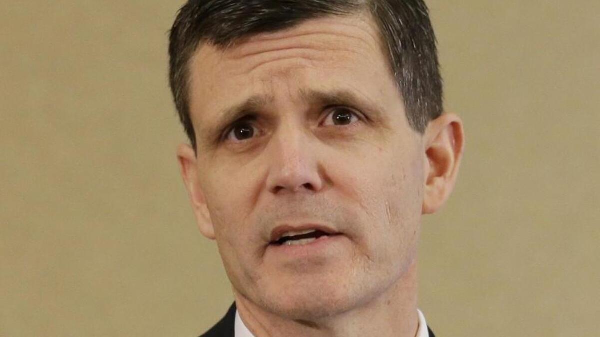 Washington state Auditor Troy Kelley talks to reporters in April.