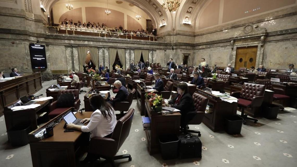 Members of the Washington Senate work on legislation, Tuesday, March 6, 2018, at the Capitol in Olympia, Wash. The last day of the regular legislative session is Thursday, March 8, 2018.