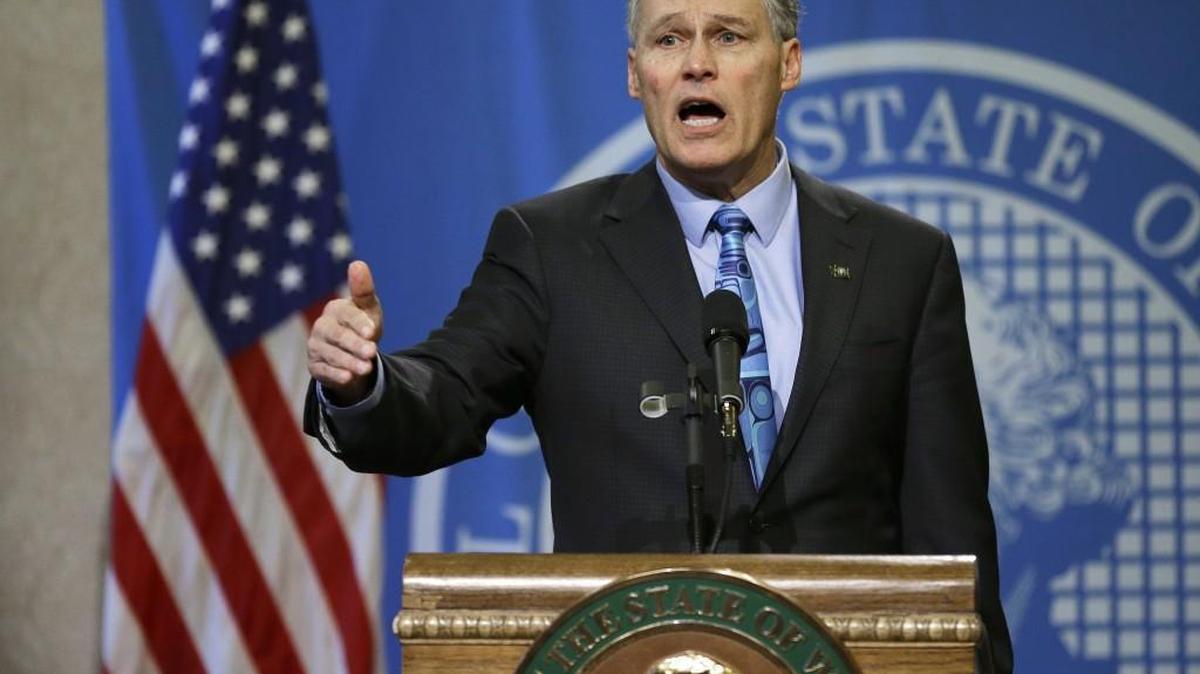 Washington Gov. Jay Inslee talks to reporters Monday, March 6, 2017, at the Capitol in Olympia, Wash.