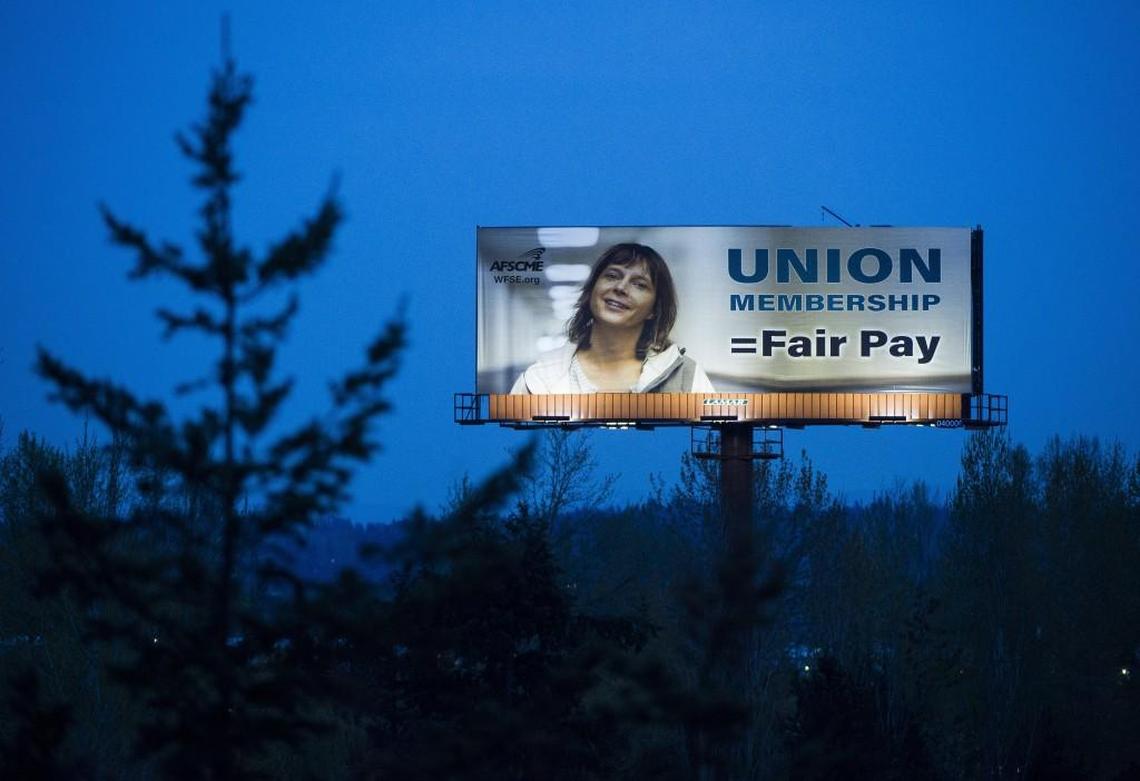 A billboard promoting unions is visible along southbound I-5 near Fife, Wash., on Monday, April 9, 2018.