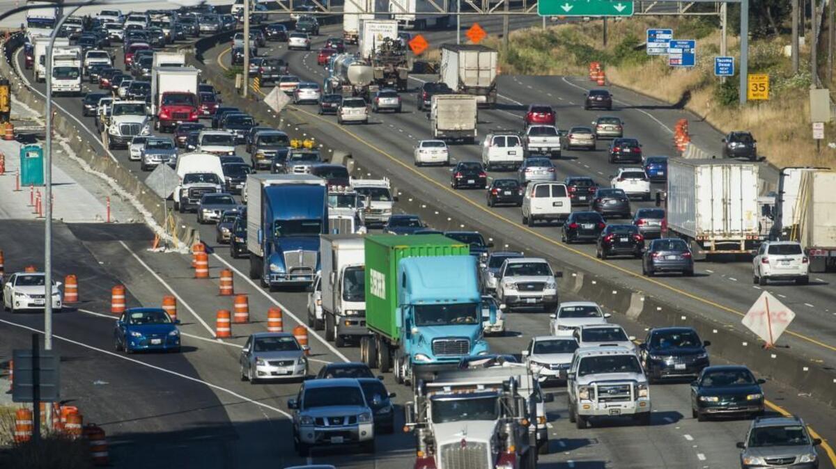 The morning commute through Tacoma, as seen here on Friday, June 23, can be rough. Could driverless cars help ease it? Maybe, maybe not, according to experts.