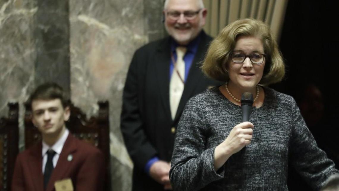 Sen. Christine Rolfes, D-Bainbridge Island, right, speaks on the Senate floor during debate over the supplemental budget, Thursday, March 8, 2018, at the Capitol in Olympia, Wash., on the final day of the regular session of the Legislature. The Legislature has sent Gov. Jay Inslee a supplemental state budget that puts more money toward teacher salaries, the final step in a multiyear process to bring Washington state into compliance with a state Supreme Court mandate on education. (AP Photo/Ted S. Warren)