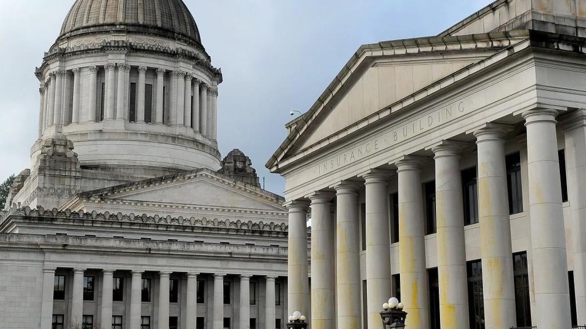The Legislative Building (left) and the Insurance Building are shown in November 2016. Lawmakers are in the second week of a 30-day special session as they work toward a deal on a state budget. That means redoing some of the work they did in their first 105 days.