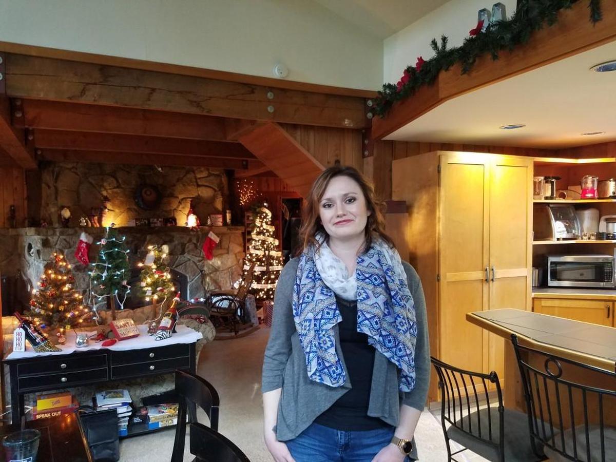 OraLynn Reeve, the ex-wife of Matt Manweller, standing in her Duvall home. Manweller is now a state representative from Ellensburg.