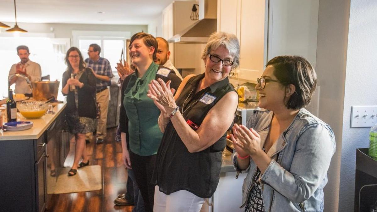 Lynda Foster, Jeannie Mitchell and Natalie Bonanno, right, attend a fundraiser held Wednesday by the 27th District Democrats. It was to help with the costs borne by delegates to the Democratic National Convention in Philadelphia.