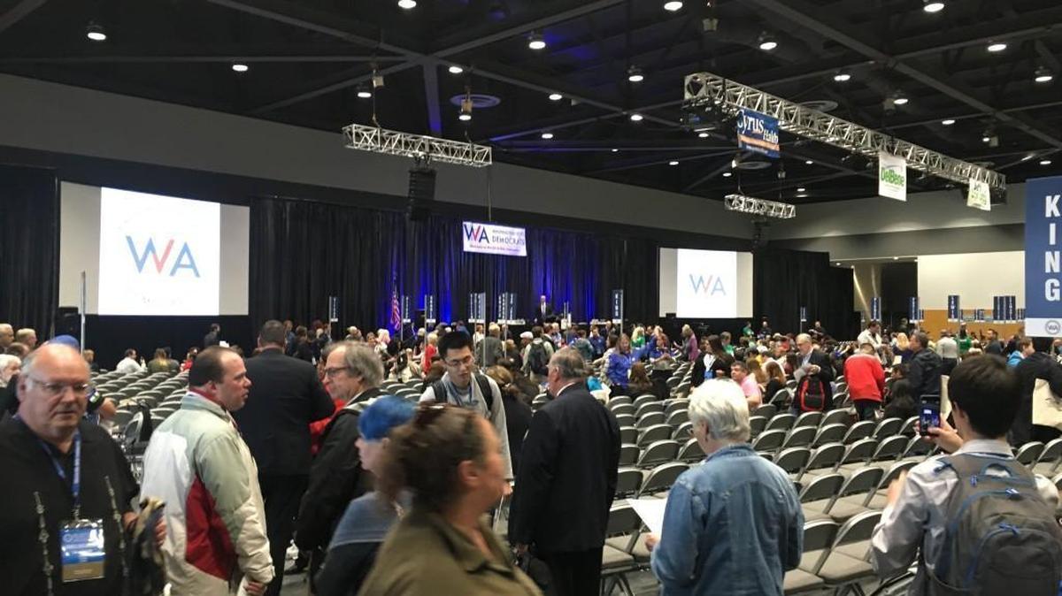 Democrats file Saturday into the a room at the Greater Tacoma Convention and Trade Center for the main day of the state Democratic convention. About 1,400 delegates were scheduled to vote on changes to the state party’s platform and internal rules.