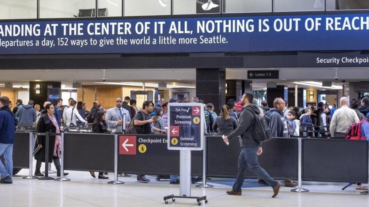 The crowds flow through security screening at Seattle-Tacoma International Airport on Nov. 21.