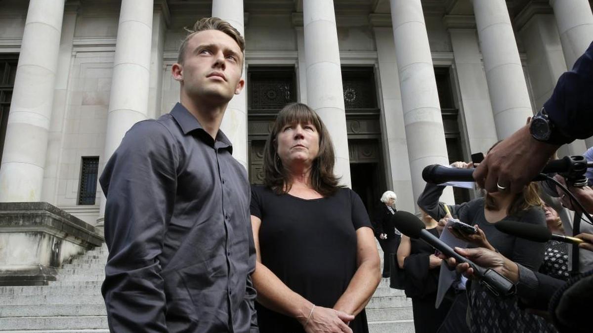Stephanie McCleary, right, and her son Carter McCleary, 17, left, talk to reporters Wednesday, Sept. 7, 2016, in Olympia, Wash., following a Washington State Supreme Court hearing on the ongoing battle surrounding the state's constitutional requirement to properly fund basic education. Stephanie McCleary is one of the plaintiffs in the case.