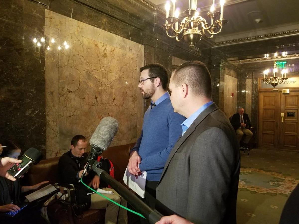 GOP state Sens. Joe Fain of Auburn (left) and John Braun of Centralia (right) talk to reporters about bills related to union membership and employee birthdates on Thursday in Olympia.