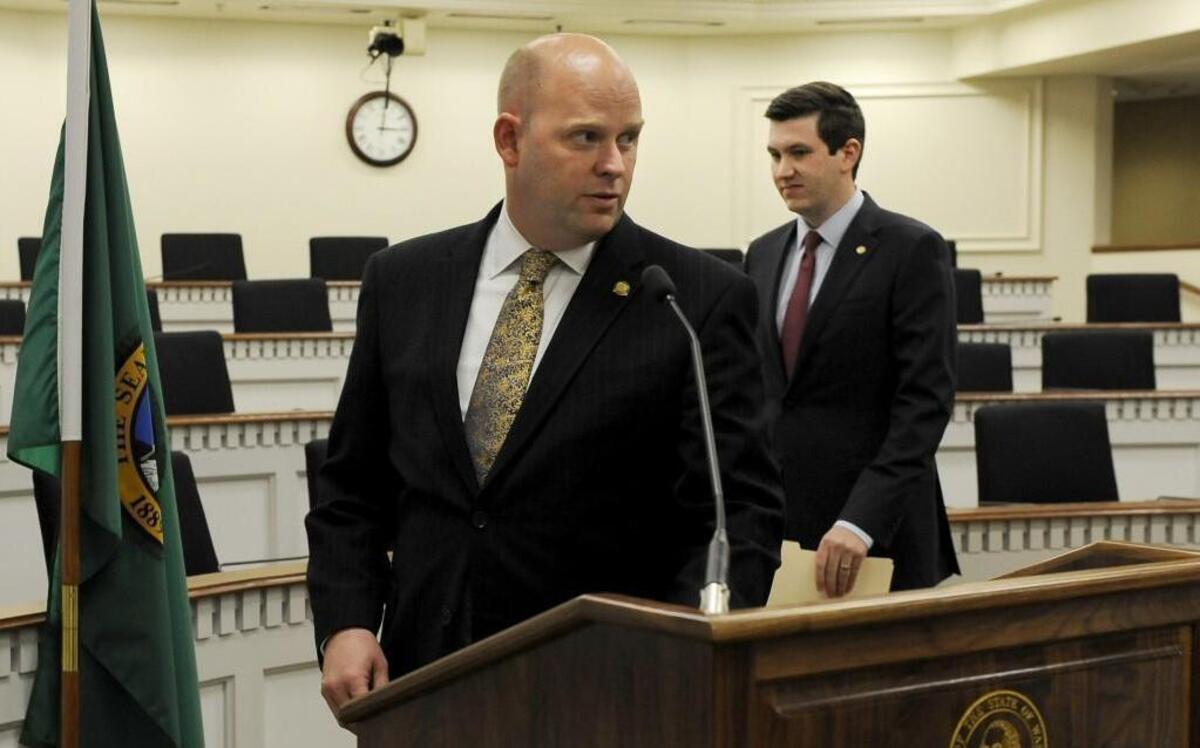 Republican Reps. Drew MacEwen, left, and Drew Stokesbary, shown here at a May 12 press conference in Olympia, announced a resolution for drafting impeachment articles against state Auditor Troy Kelley on Monday.