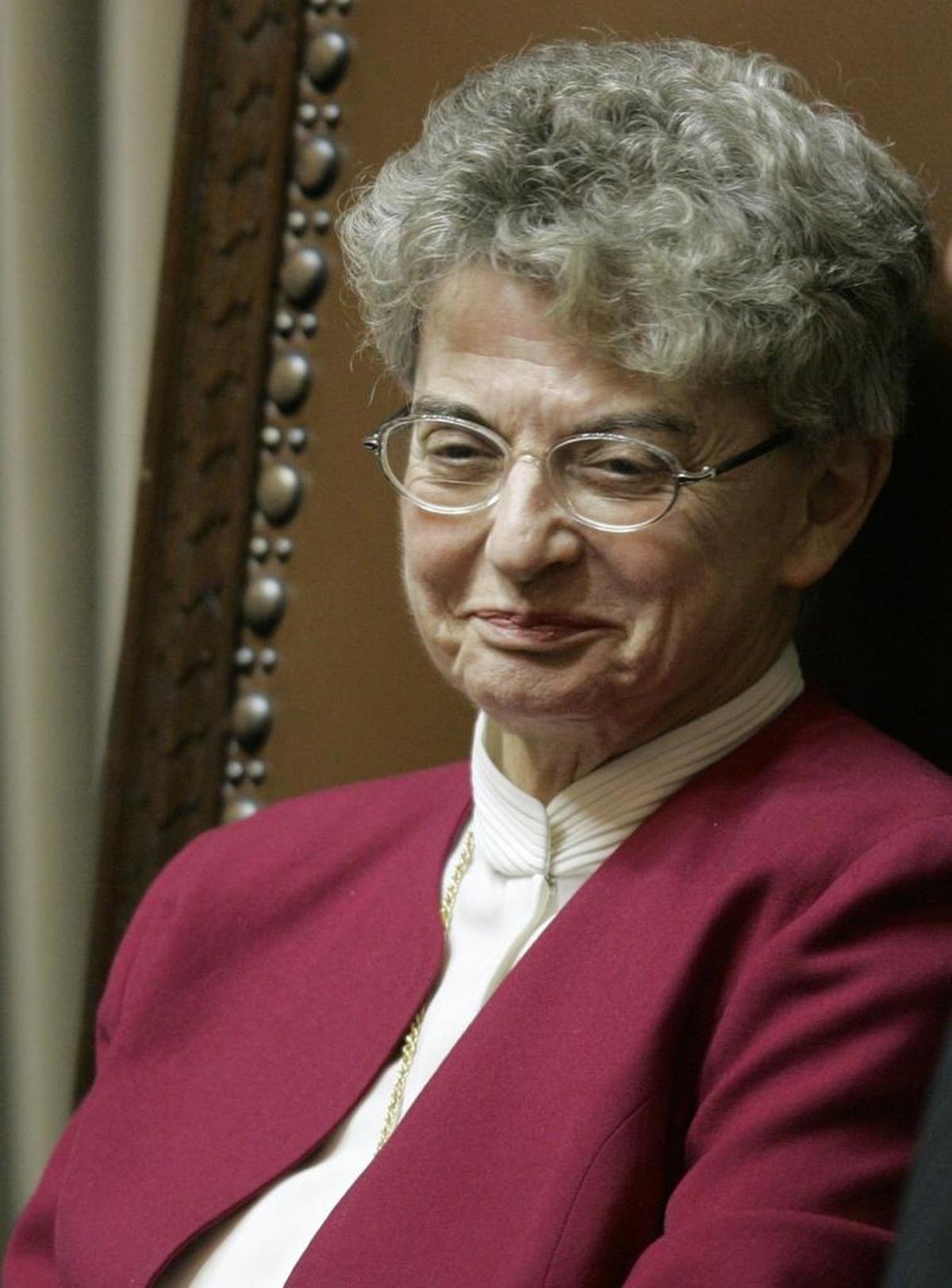 Rep. Helen Sommers, D-Seattle, is seen here on the Senate rostrum after receiving honors from legislators on the final day of the 2008 legislative session at the Capitol in Olympia.