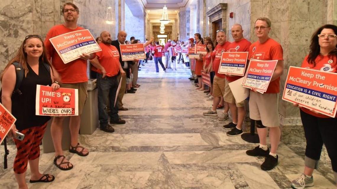 Members of the statewide teachers union descend on the Capitol Campus Tuesday, May 23 to rally for increased school funding as the Legislature finishes its first special session of 2017. Union members are urging lawmakers to reject the budget proposal from the Republican Senate majority. A new radio ad from the union makes some dubious claims about how the Republican proposal would hurt the state’s public schools.