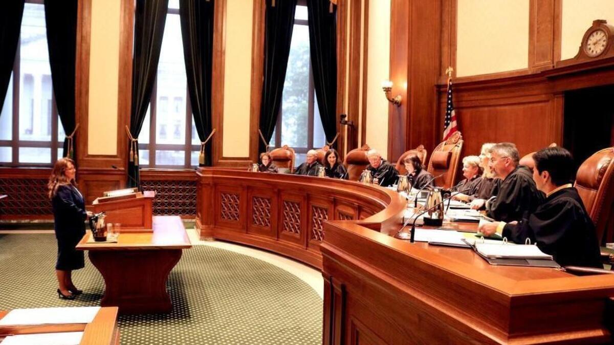 Susan Carlson is sworn in as the first female state Supreme Court Clerk on Thursday.