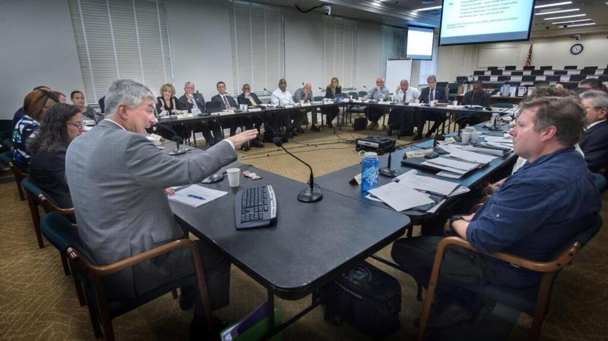 Tom McBride, Washington Association of Prosecuting Attorneys, explains police officer use-of-force rules during a joint legislative task force on the state’s law, in Olympia in September.