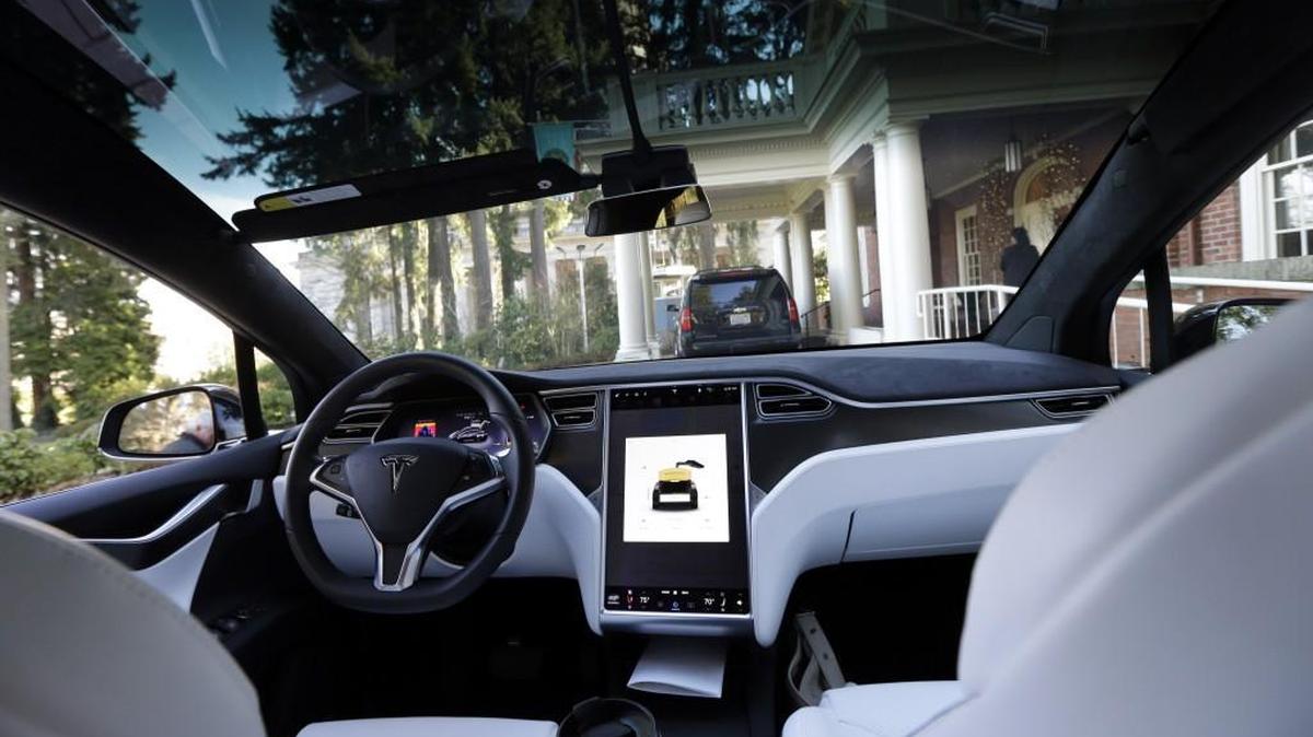 The interior of a Tesla Model X 75D semi-autonomous electric vehicle is shown as it is parked at the Governor's Mansion, Monday, Jan. 23, 2017, at the Capitol in Olympia, Wash. Gov. Jay Inslee test-drove the car to highlight the state's role in the testing and development of autonomous vehicle technology and to tout the environmental and safety benefits of the vehicles. On Wednesday, Inslee signed an executive order directing the state to partner with companies to allow new pilot programs for self-driving cars.