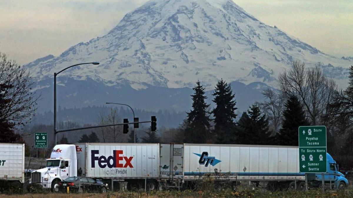 Heavy truck traffic often clogs the roads at the end of state Route 167 where it ends at the Puyallup city limits.