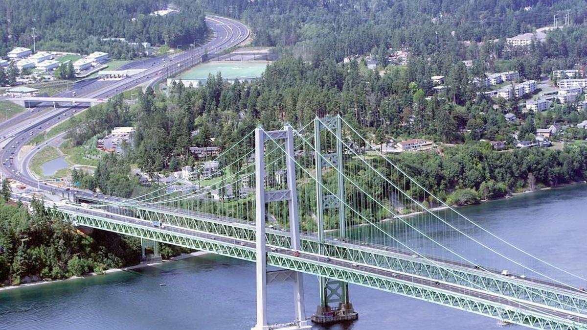 The old and new Tacoma Narrows bridges are shown shortly after the new bridge’s 2007 opening.