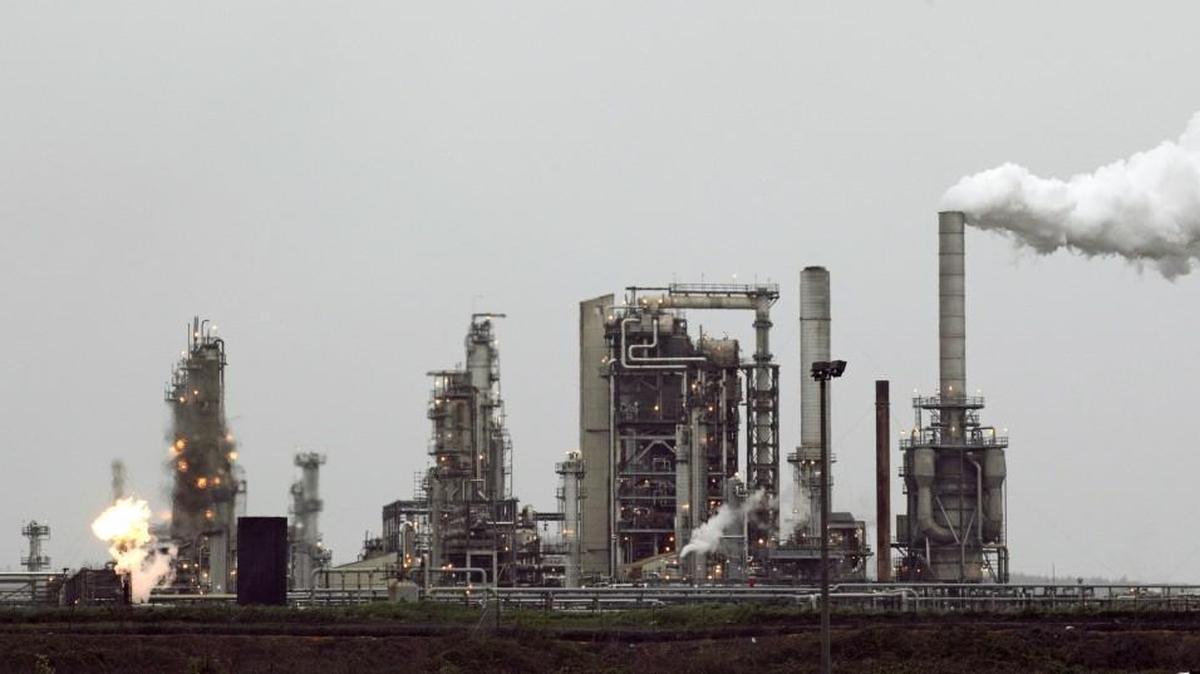 This April 2, 2010 photo shows the Andeavor Corp. refinery in Anacortes, which was formerly a Tesoro refinery. Several groups are working on an initiative for the November 2018 ballot that would tax carbon emissions from fossil fuels such as coal and gasoline. Leaders of Northwest tribes say they might have to introduce their own, separate initiative.