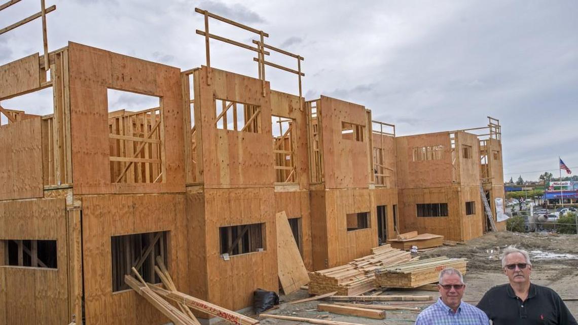 iStudios North is a multi-unit apartment development being built near the Tacoma Mall by Steve Novotny (left) and Roy Kissler, October 3, 2016.