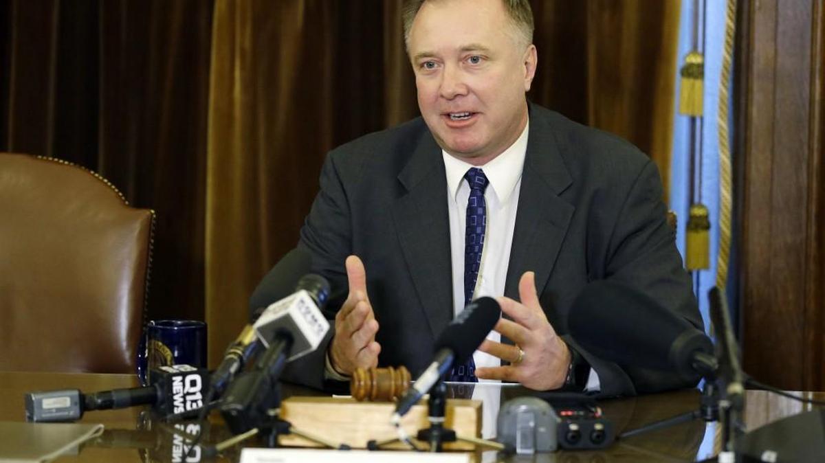 Sen. Doug Ericksen, R-Ferndale, talks to reporters last month at the Capitol in Olympia. Ericksen, who is serving as both a state senator and a member of President Donald Trump’s transition team, said the Republican majority in the state Senate can rely on him, and that he’s able to do both jobs.
