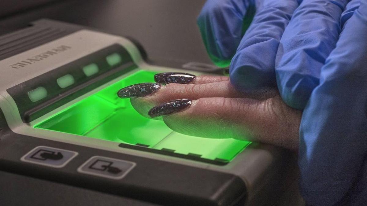 Fingerprints are scanned electronically at the Washington State Patrol's Criminal Records Division in Olympia. A new Washington state law that aimed to protect people’s biometric data inadvertently prevented some state agencies, such as prisons, from collecting people’s fingerprints.