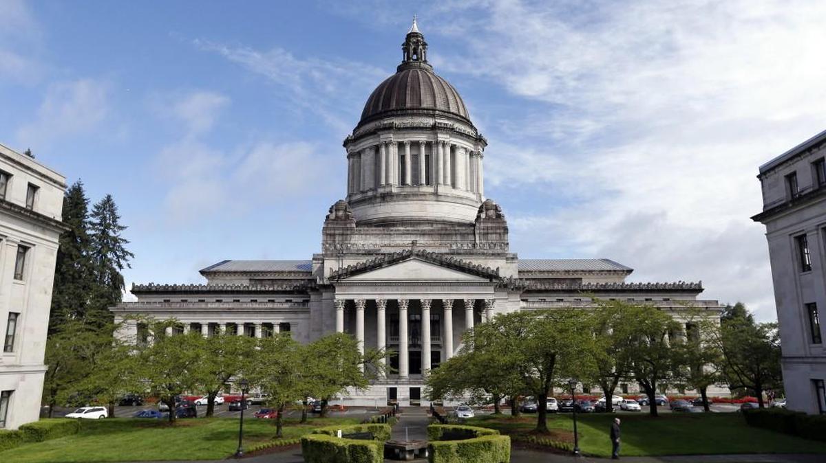 In this photo taken April 26, 2017, the Washington State Capitol, also known as the Legislative Building, is seen in Olympia, Wash. (AP Photo/Elaine Thompson)