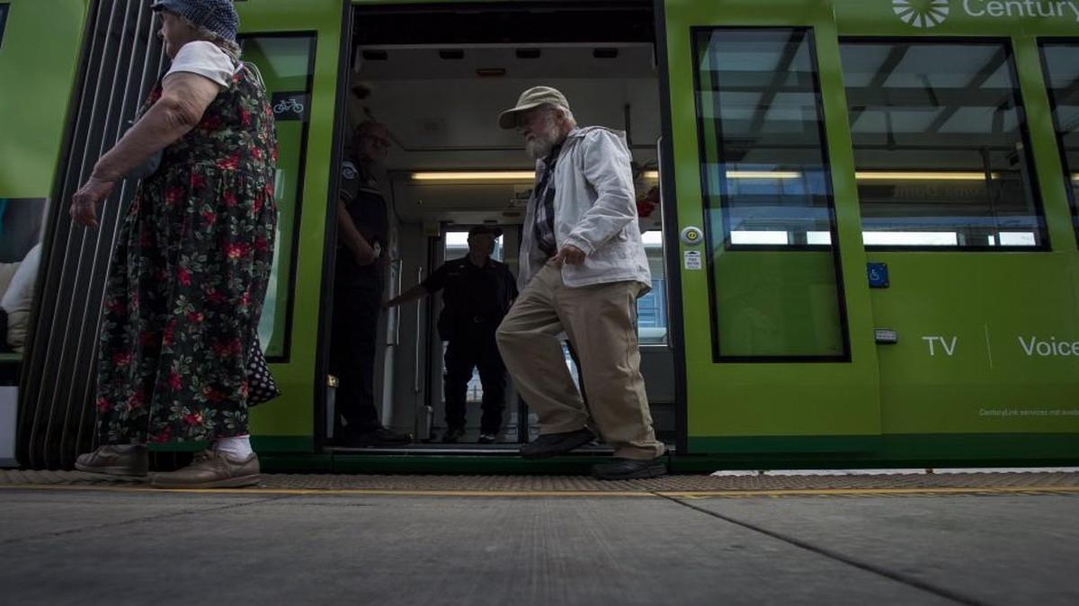 People disembark the Tacoma Link at the Tacoma Dome station on Thursday, July 20. Sound Transit, which operates Link, plans to extend light rail from SeaTac to Tacoma.