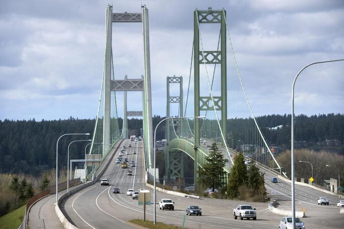 Traffic flows over The Tacoma Narrows Bridges on Wednesday, March 28, 2018.
