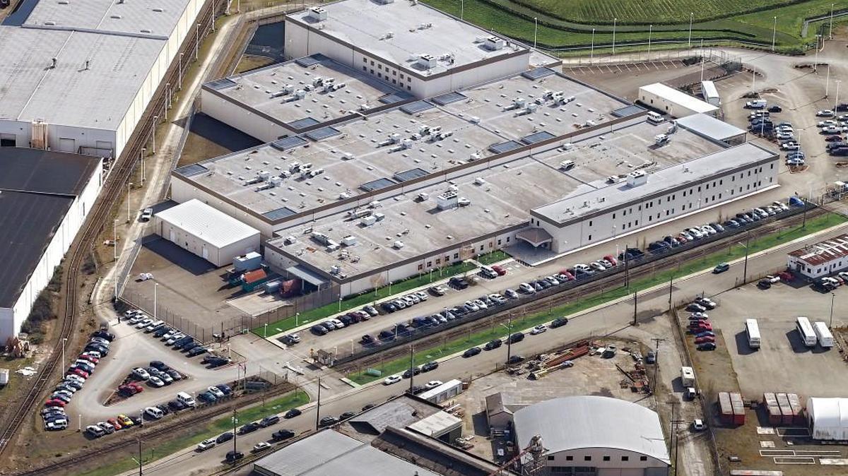The Northwest Detention Center, a privately owned and operated immigration detention center, was built on the Tacoma Tideflats to replace a similar facility in Seattle. It opened in 2004 with a 500-bed capacity and has since expanded capacity three times, to 1,575 beds, making it one of the largest immigration detention centers in the United States.
